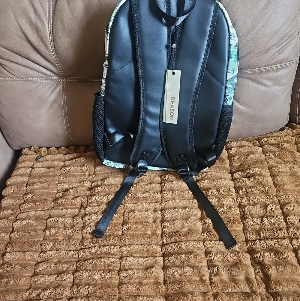 Reason Cash-Print Backpack in Green and Black with Pink Accent